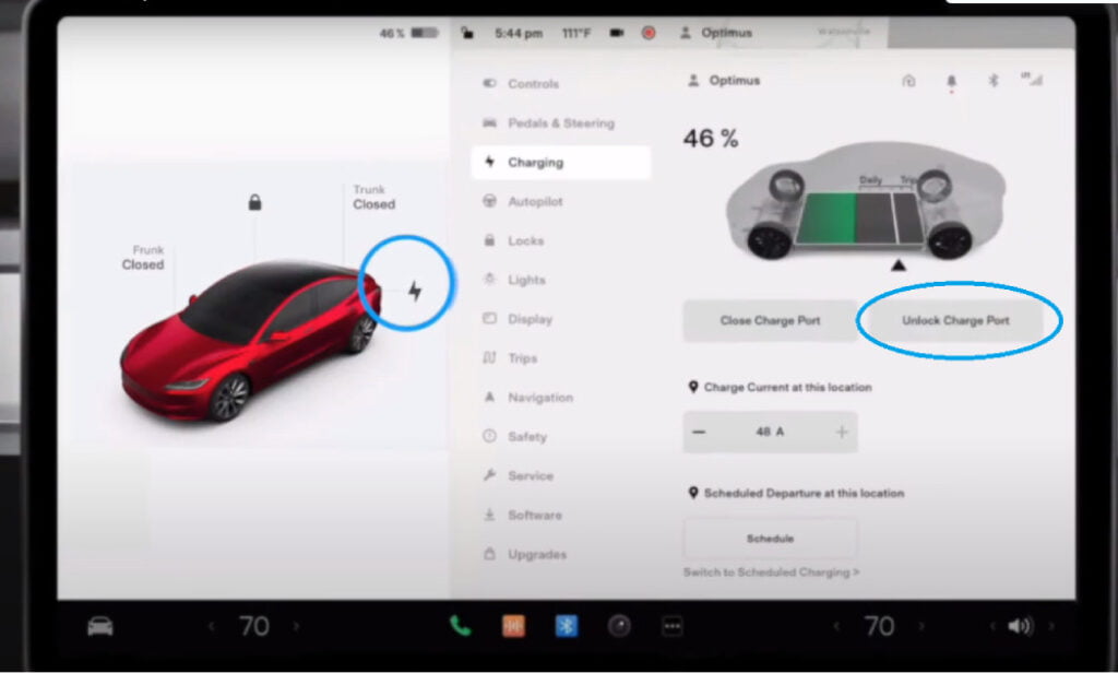 Showing Tesla dashboard screen Controls > Charging > tap unlock charge port